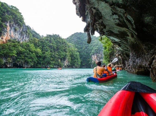 Kayaking at Phanak Island by limestone island in Phang Nga Bay