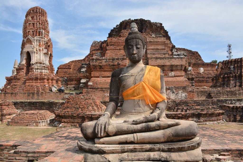 An ancient buddha statue at Wat Mahathat in Ayutthaya Historical Park, Thailand