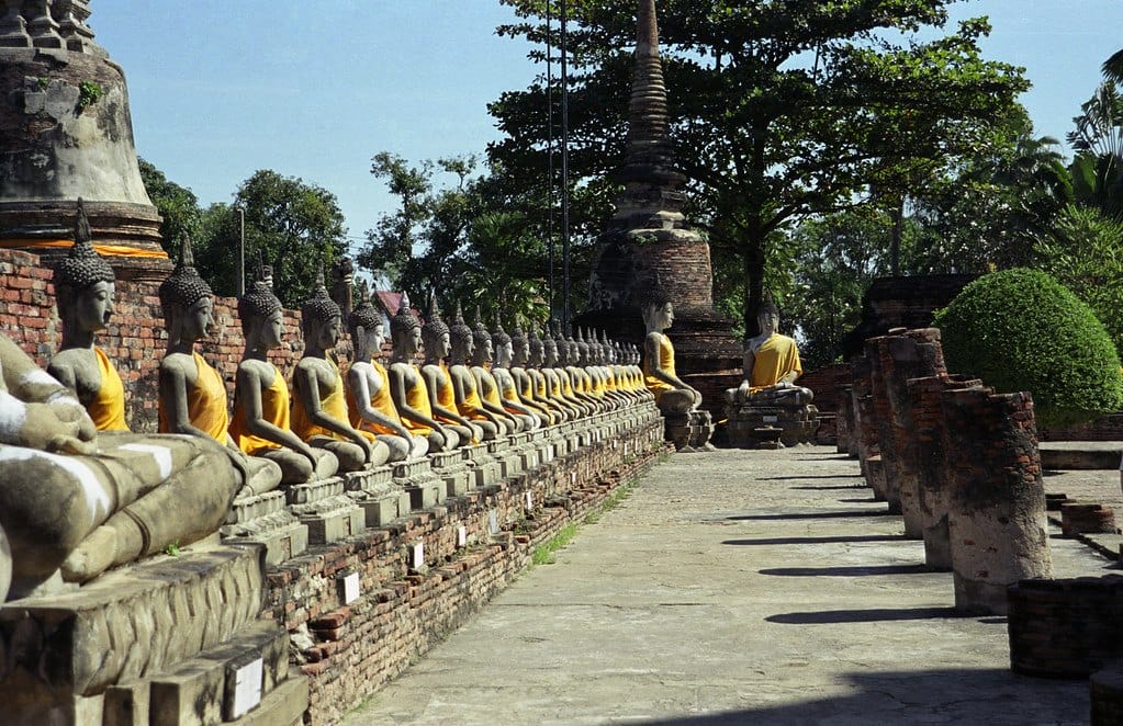 A row of ancient buddha statue at Wat Phra Sri Sanphet in Ayutthaya Historical Park, Thailand