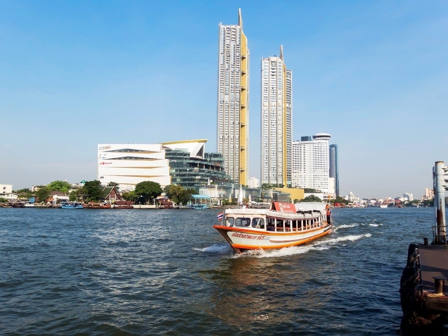 Chao Praya Express Boat-orange flag- in Bangkok, Thailand