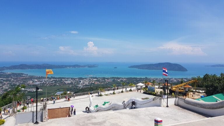 A view of ocean, island, city from stairs of Big Buddha in Phuket, Thailand