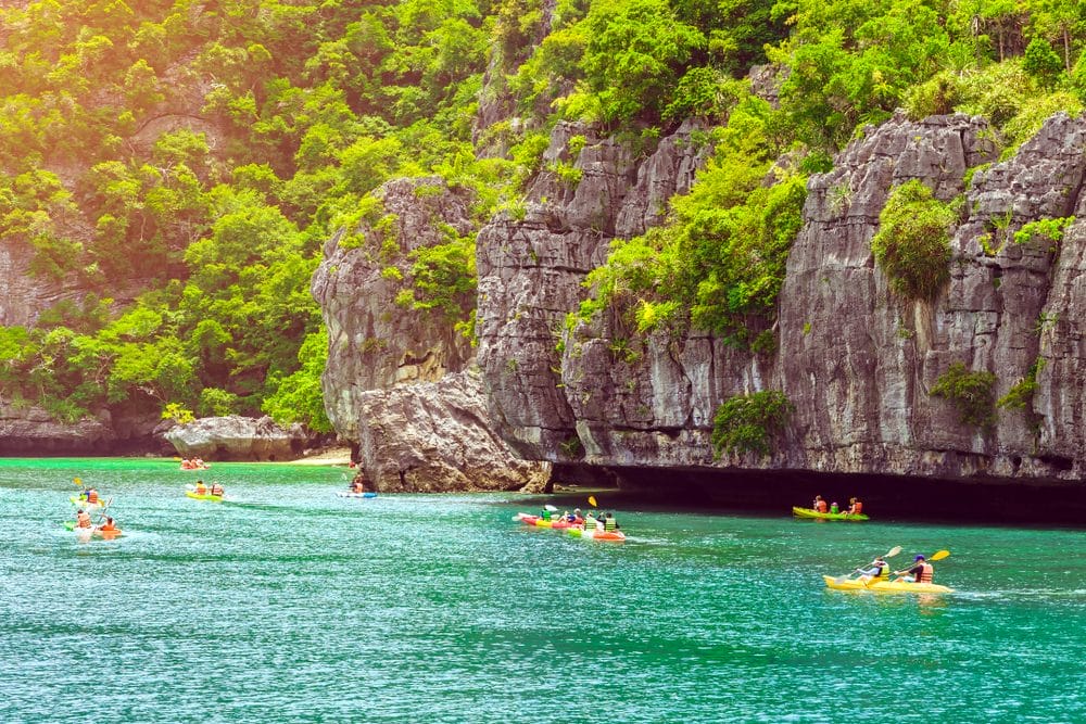 Kayaking nearby big islands in Ang Thong Nationall Marine Park in Thailand.